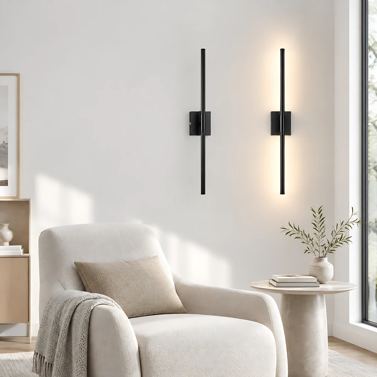 Slim black rechargeable wall sconce illuminating a reading corner