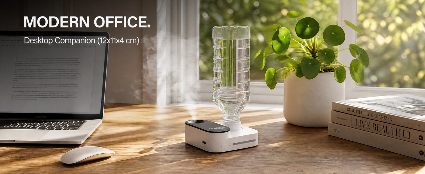 Humidifier beside a laptop in an office. The pictured body measures 12 by 11 by 4 cm.