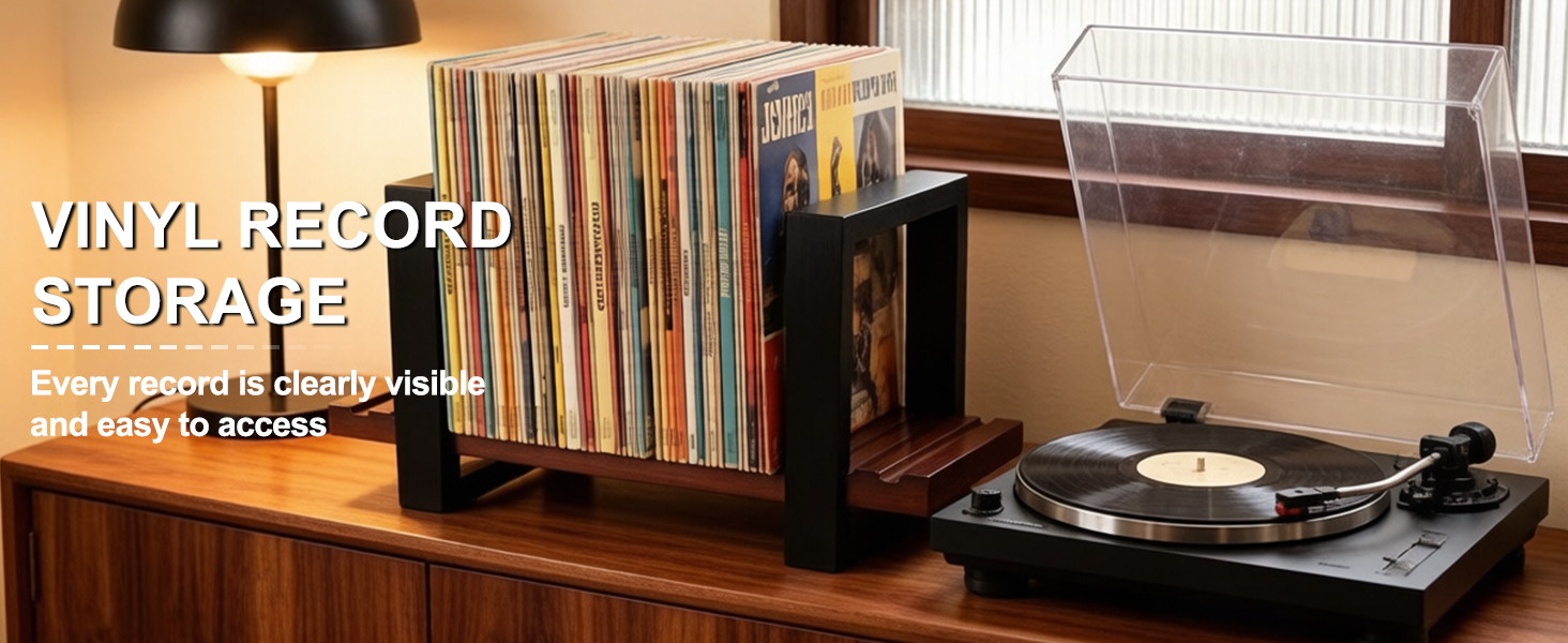 Vinyl record storage beside a turntable, with album covers visible and within reach.