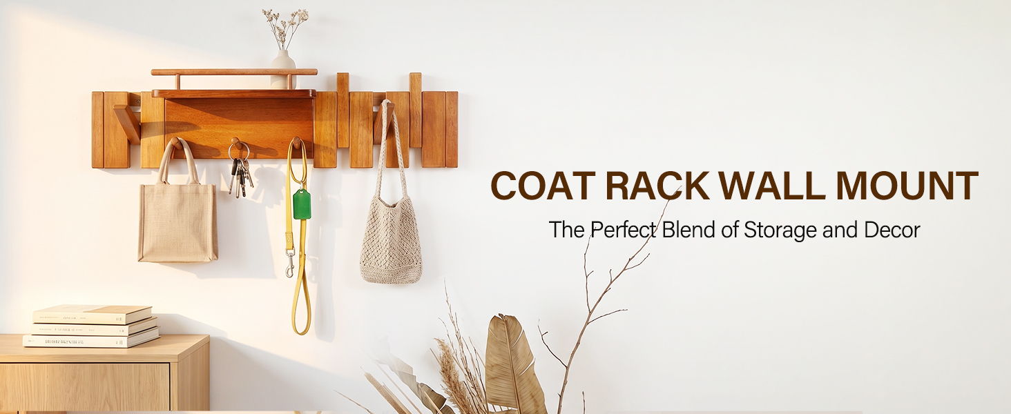 Wall-mounted wooden coat rack with a shelf, foldaway hooks and smaller key hooks.