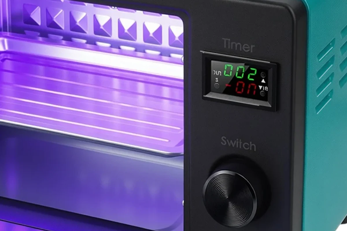Close-up of the actual GISTAR curing box timer and adjustment dial